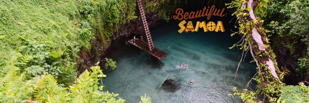 People swimming in fresh water lagoon at To Sua Ocean Trench